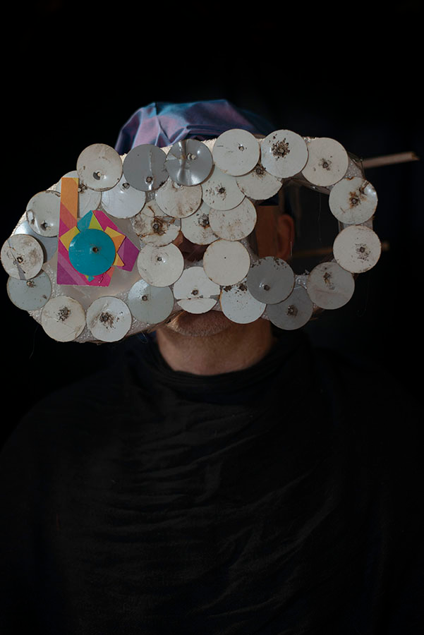 A predominantly horizontally oriented mask covered with overlapping white circles.